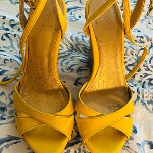 Wooden wedge heel.